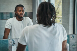 A mirror image is used to display self reflection